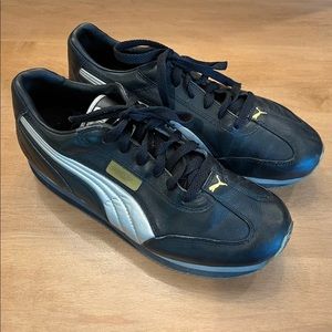 Vintage Puma runners with silver on black